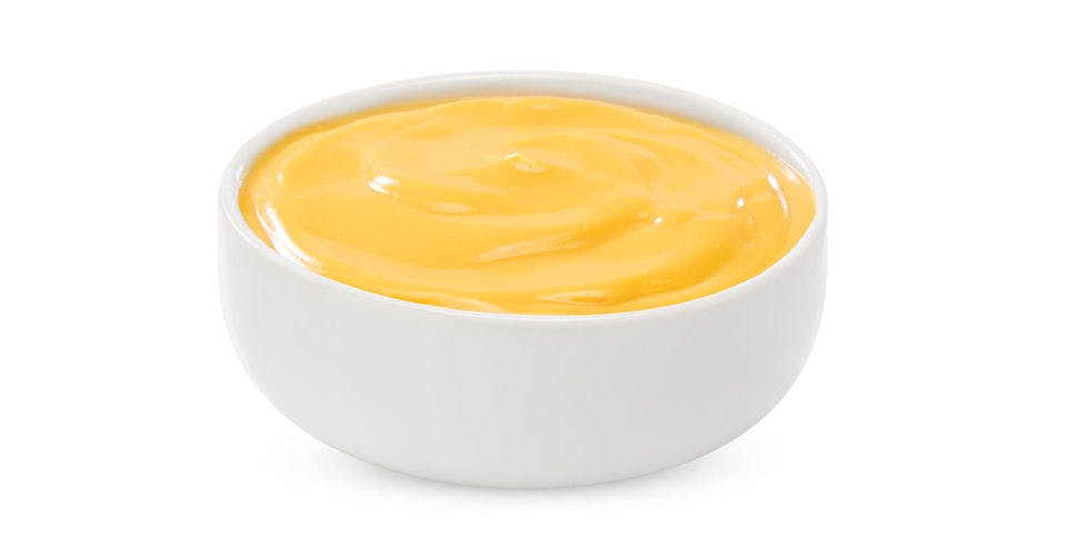 Nacho Cheese Sauce (Cup) from Toppers Pizza - Lawrence in Lawrence, KS