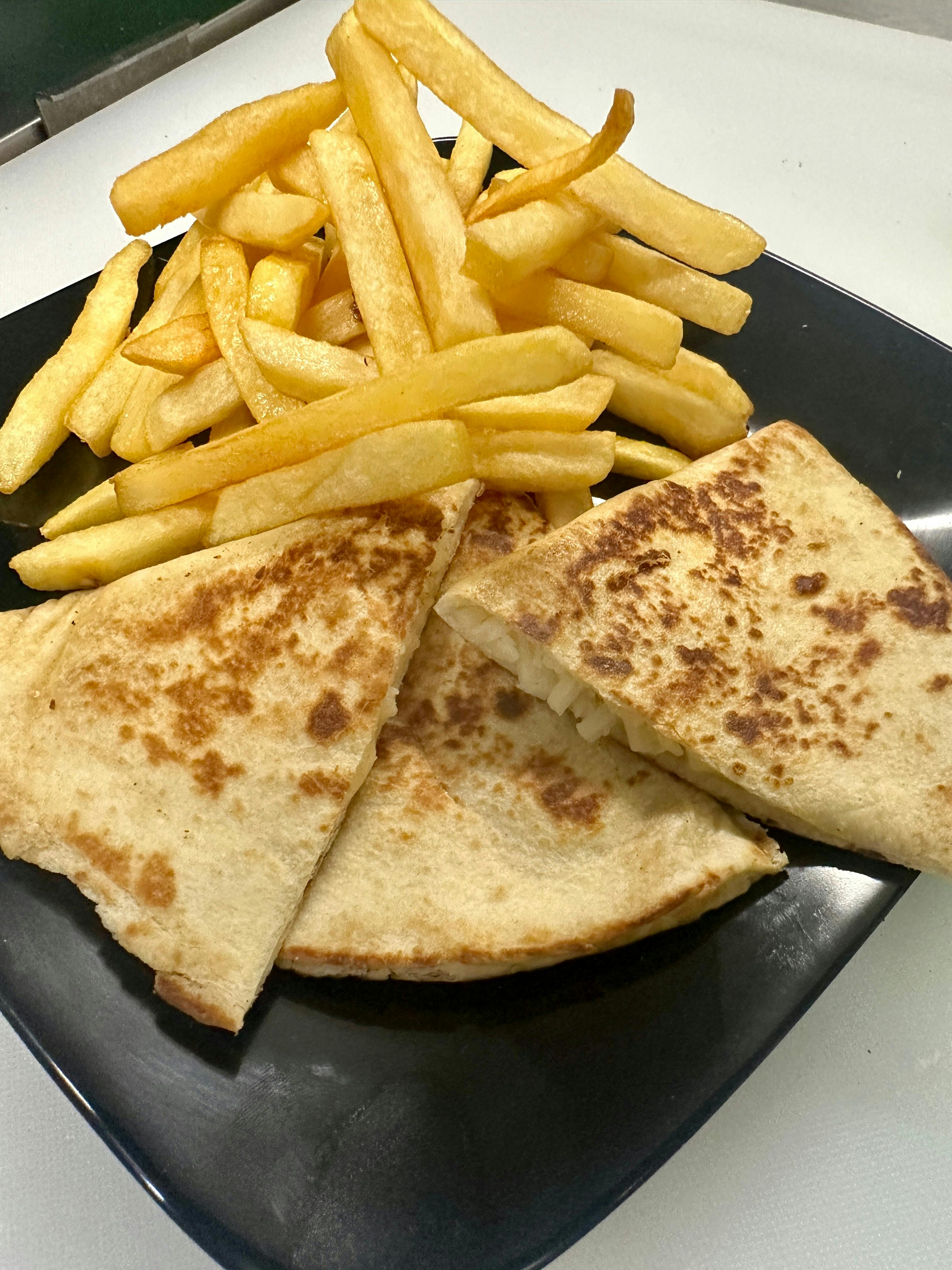 Kids Cheese Quesadilla from Justveggiez in Madison, WI