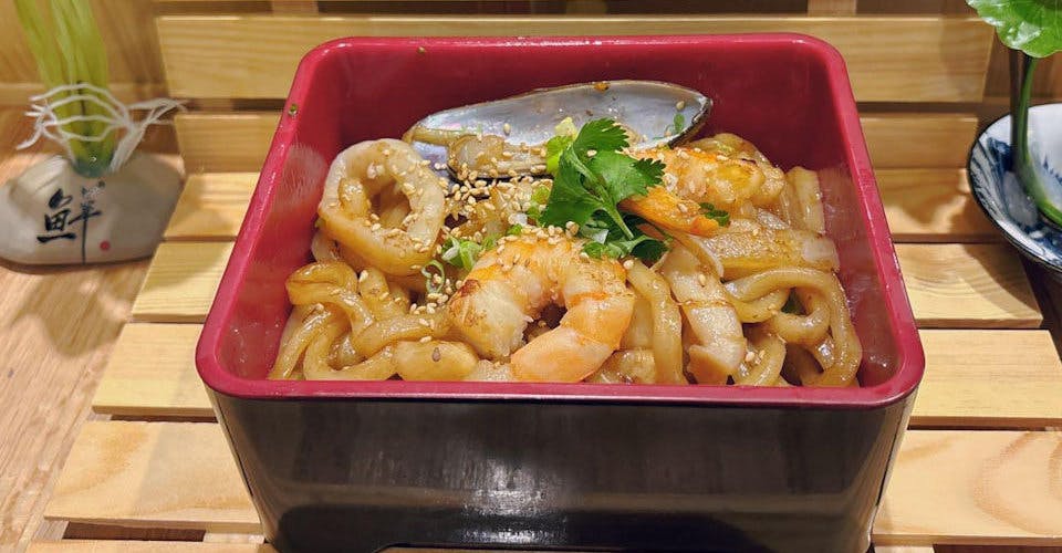 Seafood Udon from Dodomi Sushi Rotary - N Sheridan Rd in Chicago, IL