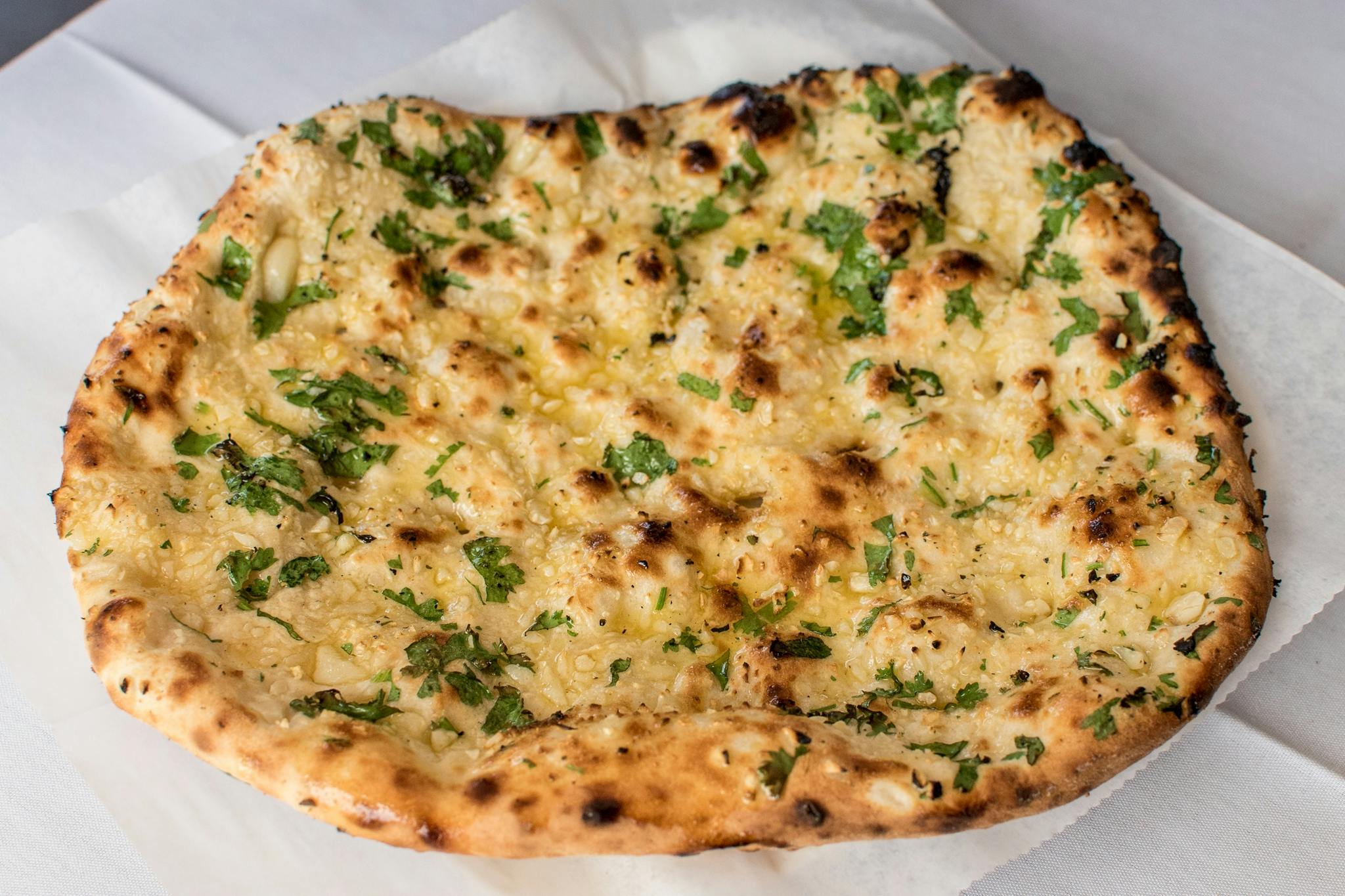 Garlic Naan from Dhaba Indian Bistro in Middleton, WI