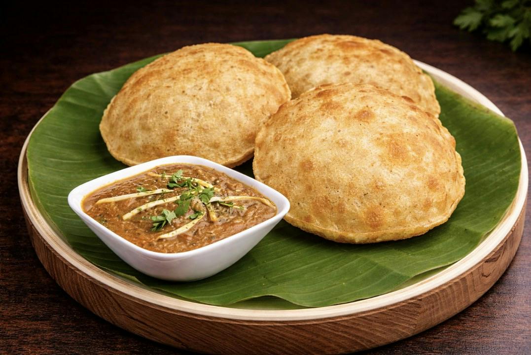 Poori with Chana Masala from Rock N Grill Indian Authentic Cuisine & Bar in Round Rock, TX