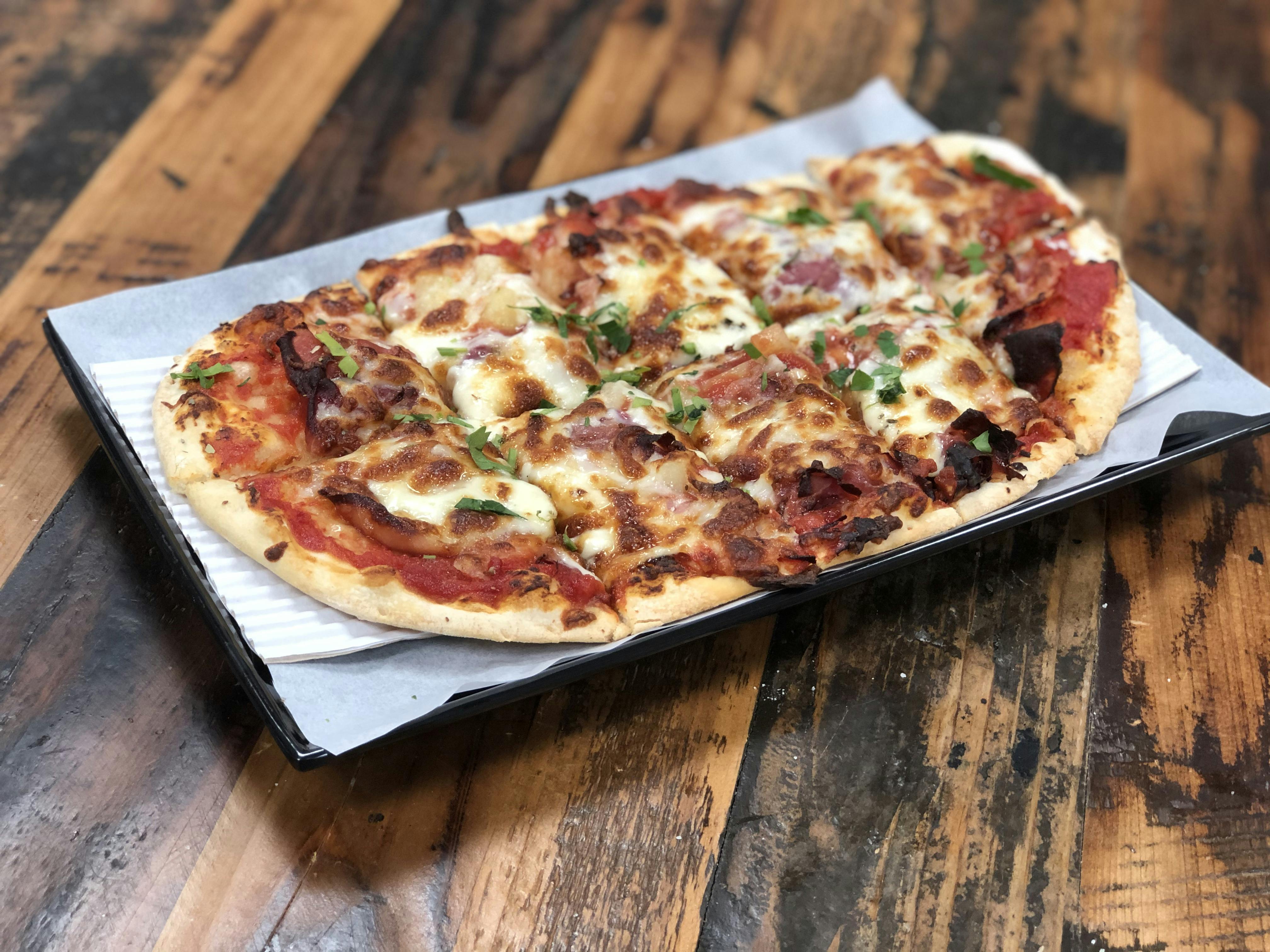 Prosciutto Pineapple Flatbread from Sip Wine Bar & Restaurant in Tinley Park, IL