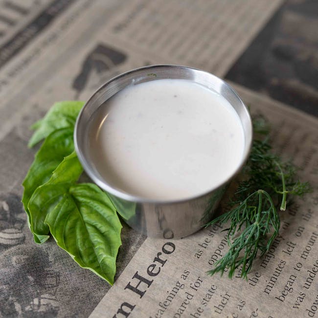 Signature Iron White Dipping Sauce from Cast Iron Pizza Company in Eau Claire, WI