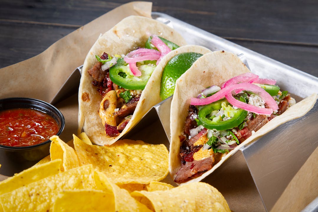 2 Smoked Brisket Tacos from The Brass Tap - Main Street in Cedar Falls, IA