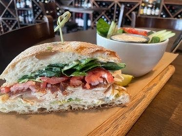 Pick Two 1/2 Chicken Bacon Avocado Deli Sandwich from The Bottle Room in Green Bay, WI