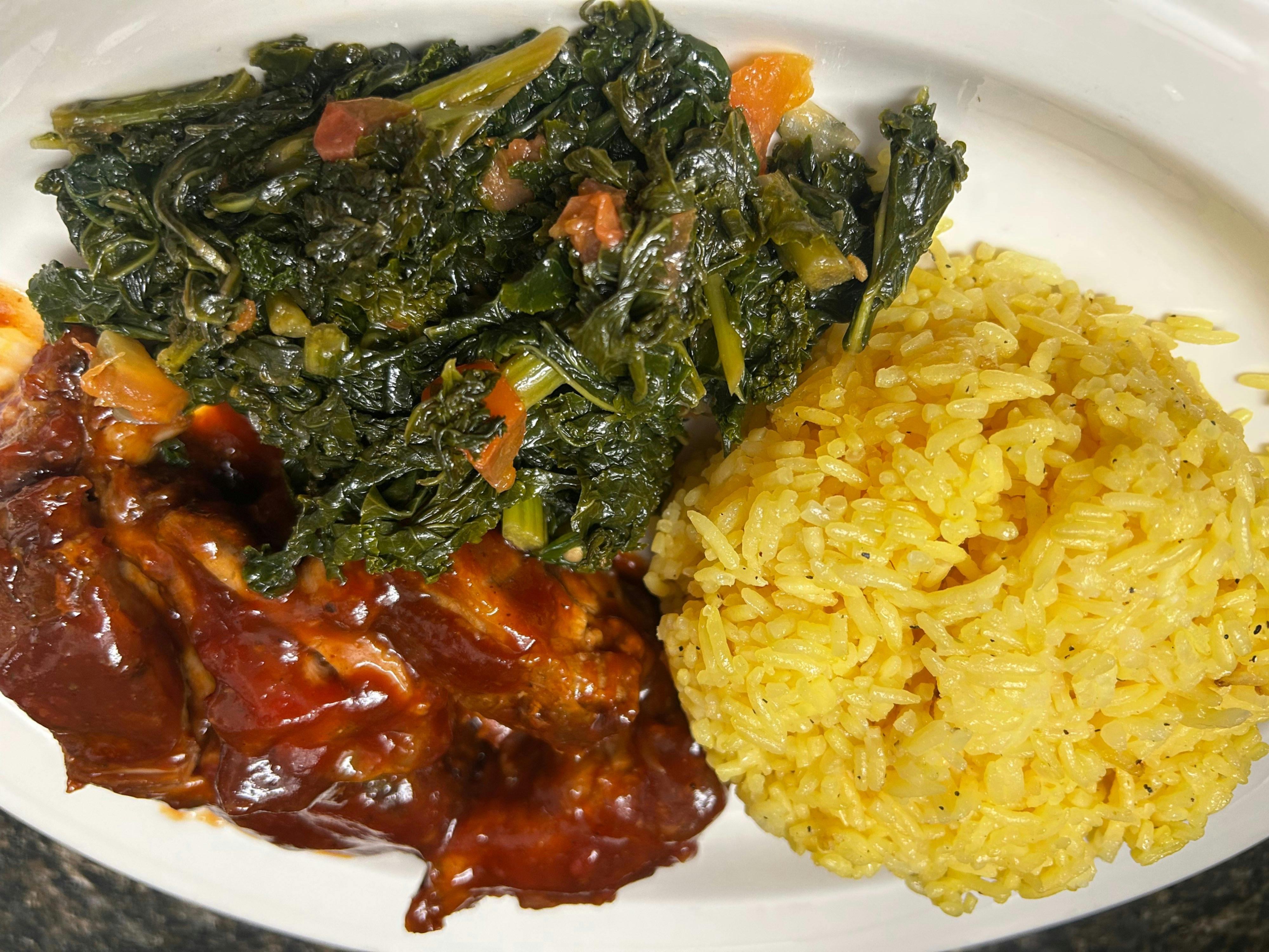 Rib tips - Slow cooked in Stango bbq and onion served with rice & greens from Stango Cuisine in Champaign, IL