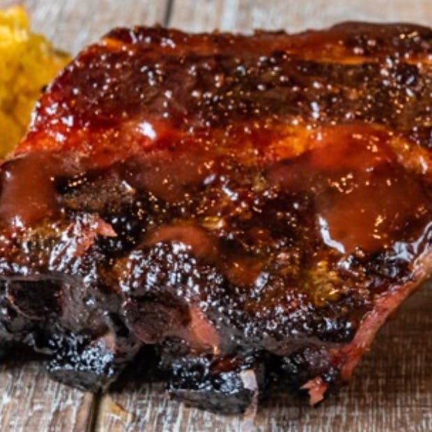 Baby Back Ribs & 2 Sides from Beef Butter BBQ - N Sherman Ave in Madison, WI