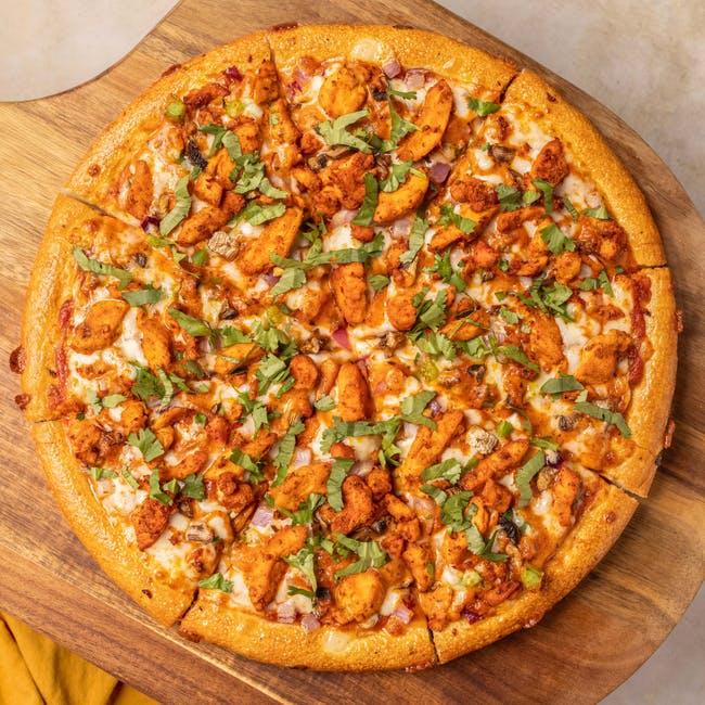 Halal Butter Chicken Pizza from Z?s Pizza - NE 8th St in Bellevue, WA