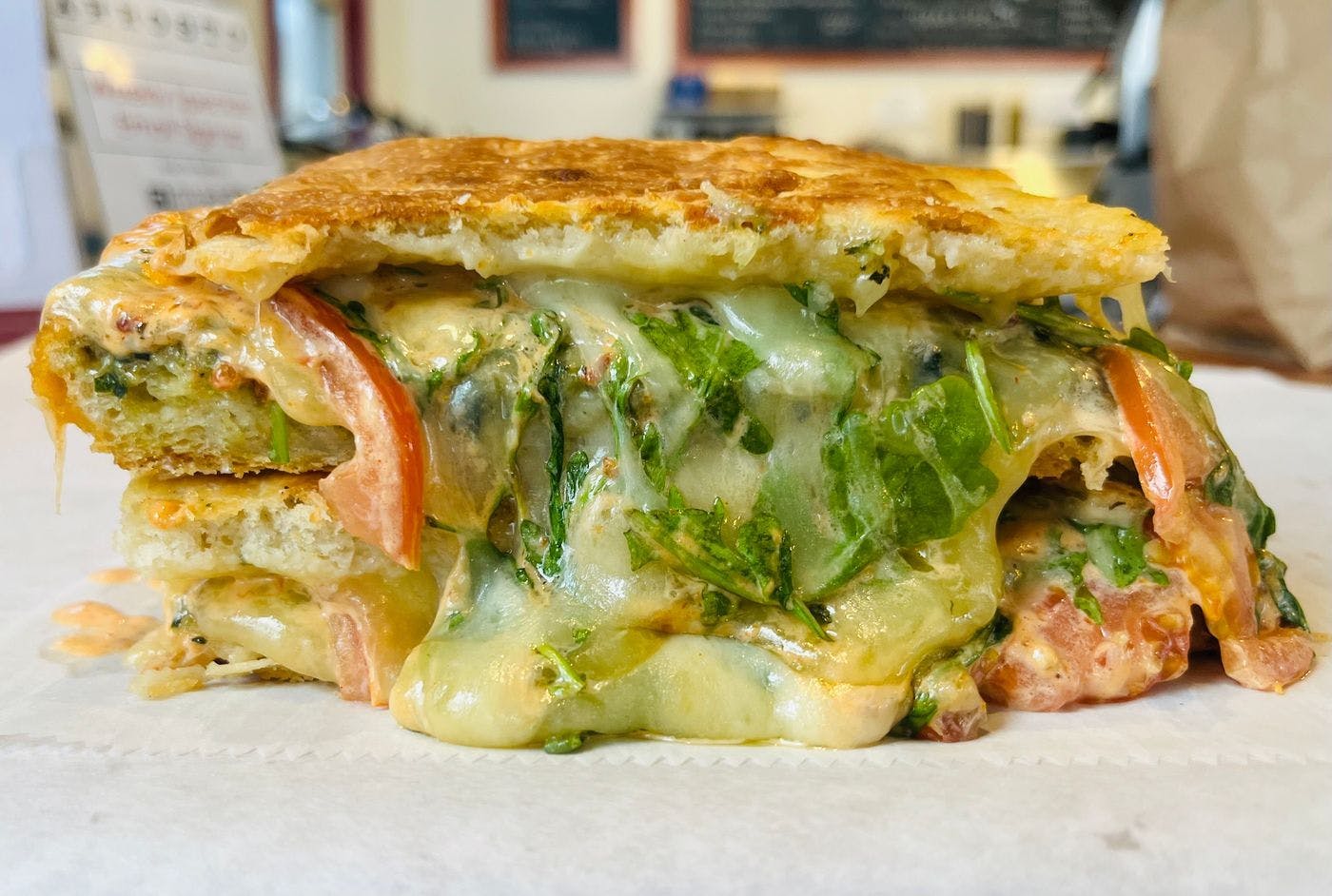 Grilled Cheese Special Panini- Sun Dried Tomato Pesto Grilled Cheese from Arrosto Delicatessen in Sheboygan, WI