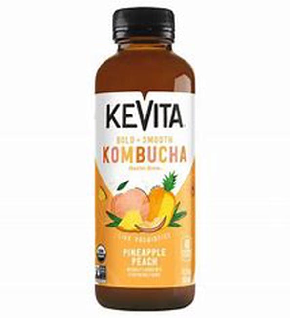 Kombucha Pineapple Peach Glass Bottle 15.2oz from Cast Iron Pizza Company in Eau Claire, WI