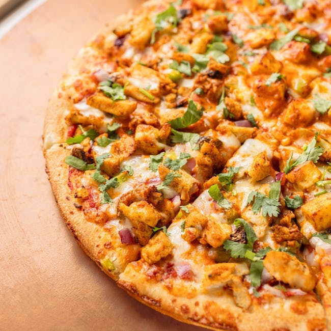 Butter Chicken Pizza from Z?s Pizza - NE 8th St in Bellevue, WA