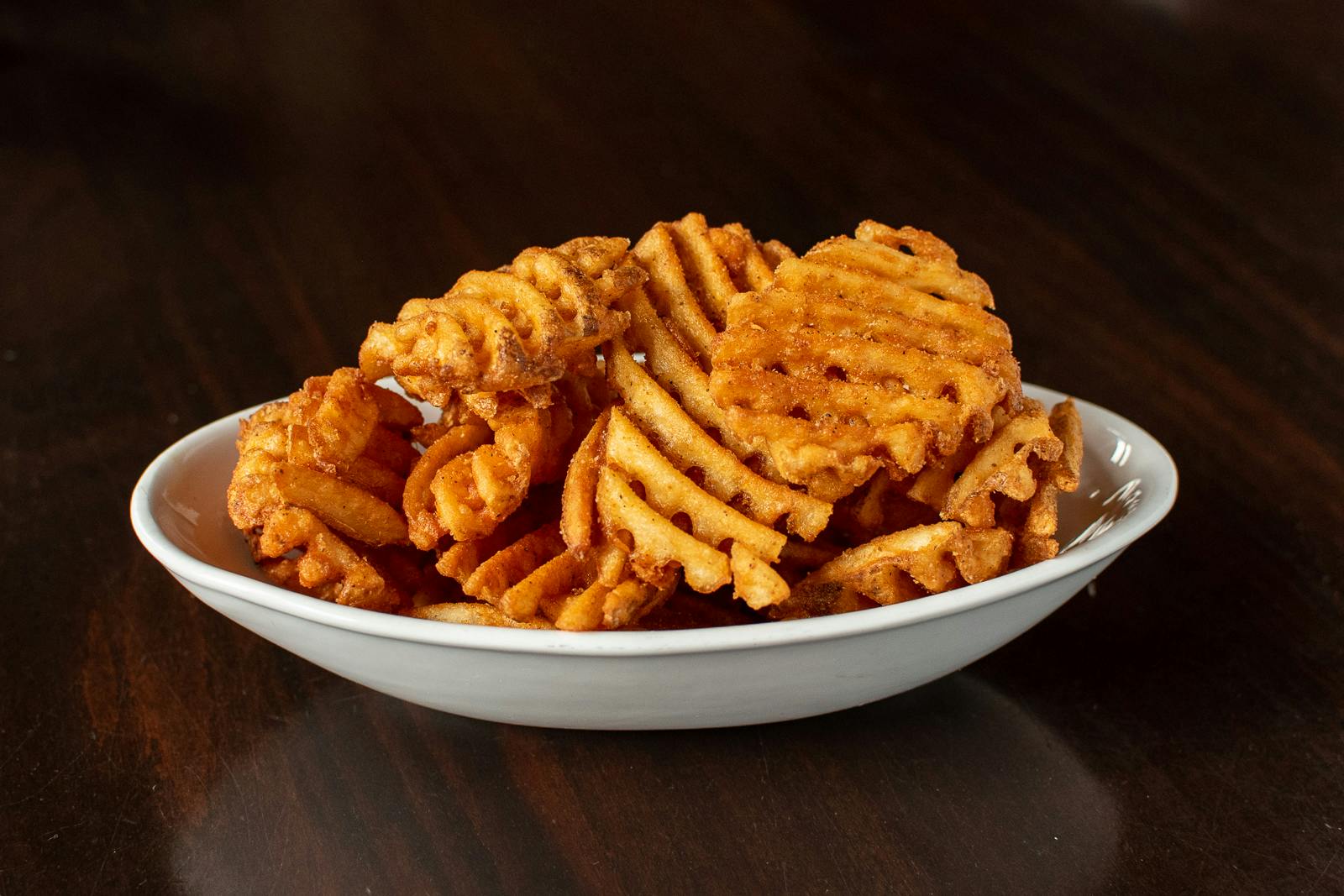 Spicy Waffle Fries from Midcoast Wings - State St in Green Bay, WI