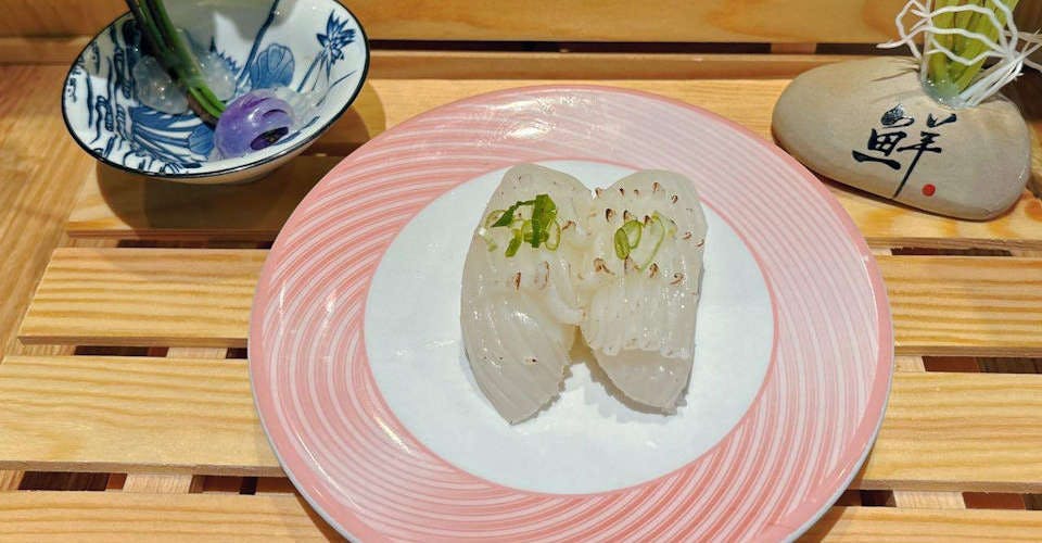 Ika Nigiri from Dodomi Sushi Rotary - N Sheridan Rd in Chicago, IL