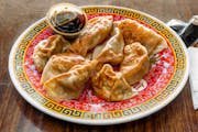 13. Traditional Pan-Fried Dumplings (8 Pieces) from Asian Flaming Wok in Madison, WI