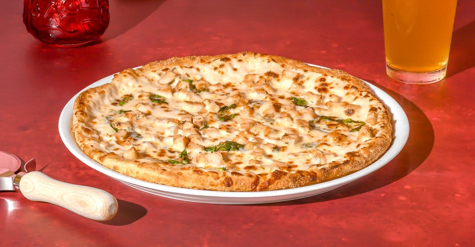 Chicken Alfredo Pizza from Luigi's in Madison, WI