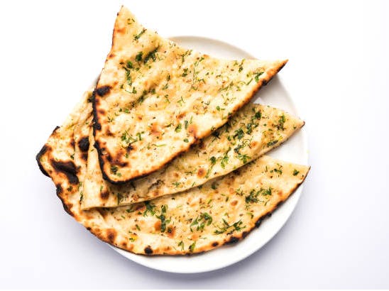 Garlic Naan from Cafe India Bar & Grill in Milwaukee, WI