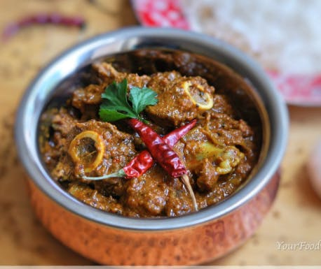 Goat Achari from Cafe India Bar & Grill in Milwaukee, WI