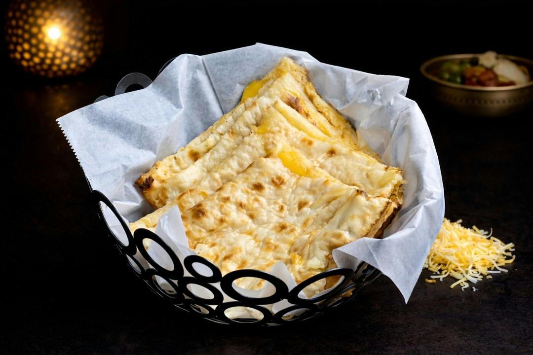 Cheese Naan from Rock N Grill Indian Authentic Cuisine & Bar in Round Rock, TX