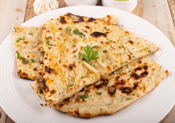 Onion Kulcha from Cafe India Bar & Grill in Milwaukee, WI