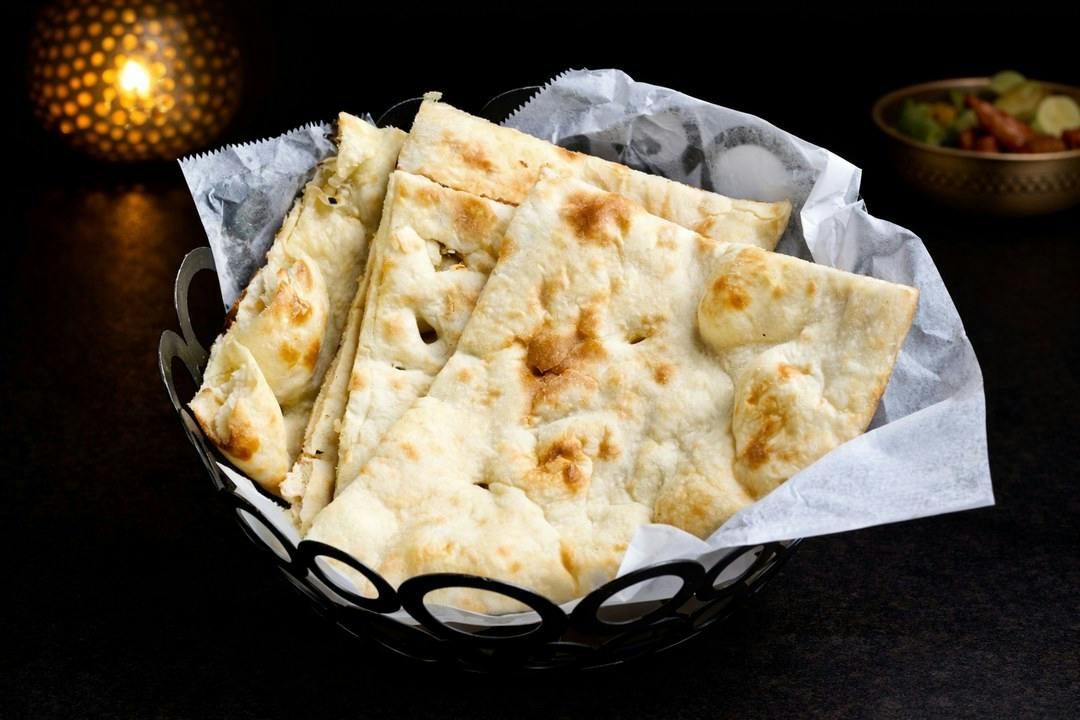 Plain Naan from Rock N Grill Indian Authentic Cuisine & Bar in Round Rock, TX