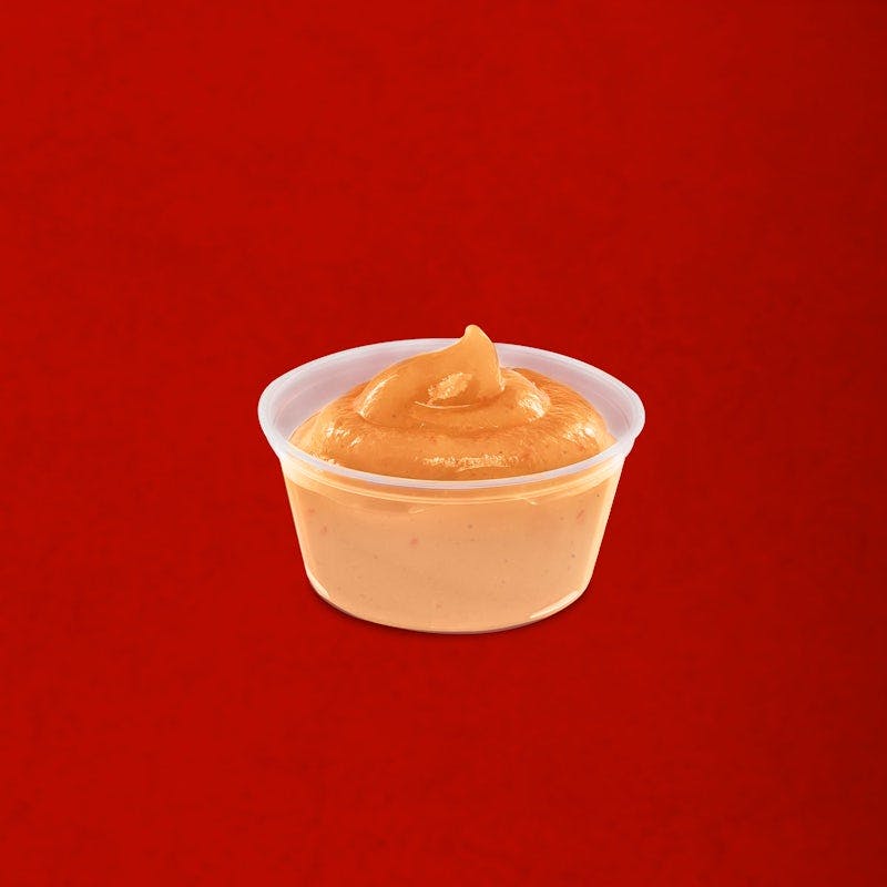 Side Daves Sauce Dipper from Dave's Hot Chicken - S Oneida St in Green Bay, WI