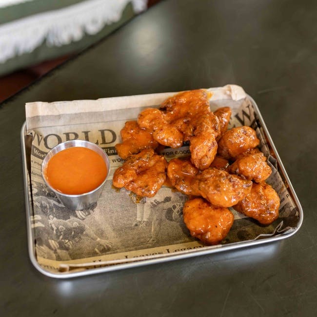 1lb Boneless Wings (12ct) from Cast Iron Pizza Company in Eau Claire, WI