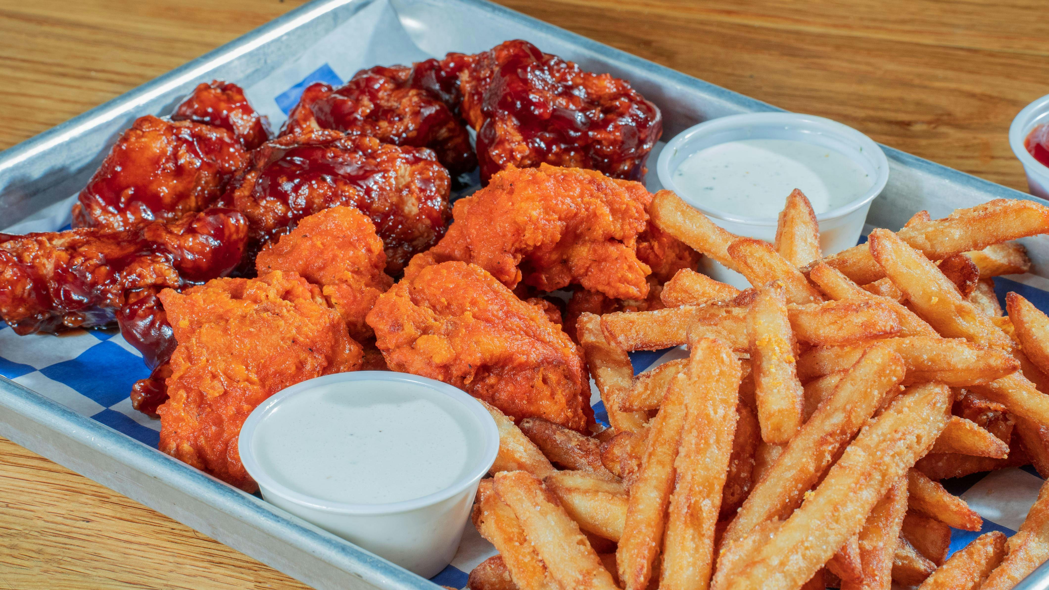 Ten Buffalo Boneless Wings with Fries from Austin Chicken Nugget  - Research Blvd in Austin, TX