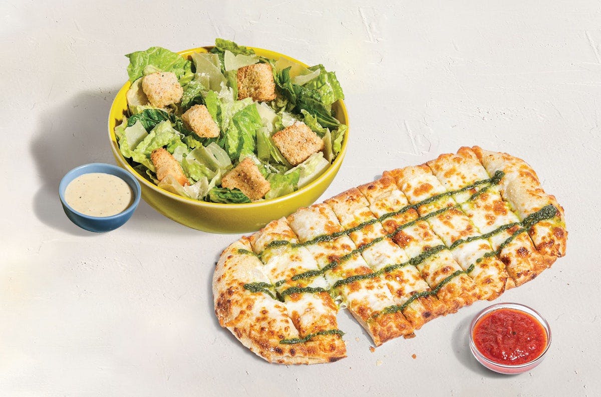 Pesto Garlic Cheesy Bread + choice of side from Blaze Pizza - Lincoln Way in Ames, IA