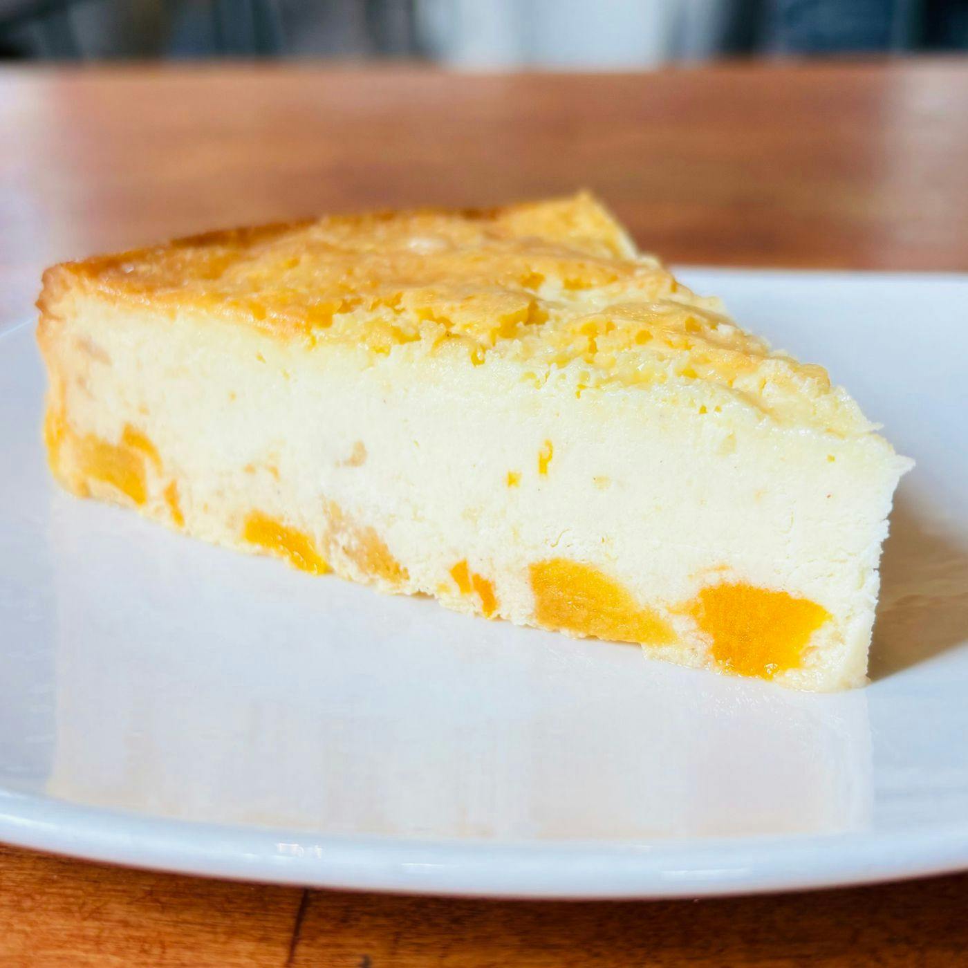 Peaches & Cream Cheesecake- Slice from Arrosto Delicatessen in Sheboygan, WI