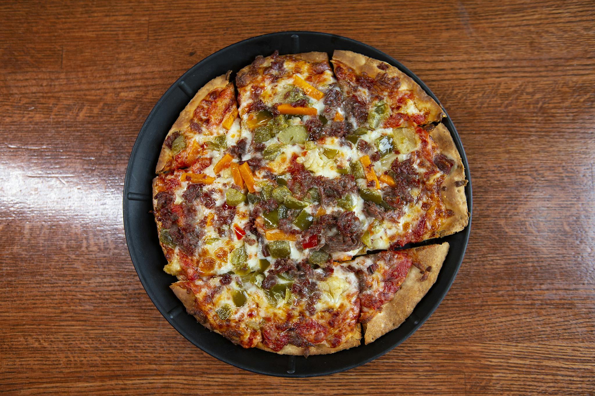 Flaming Italian Beef Pizza from Candlelite Chicago in Chicago, IL