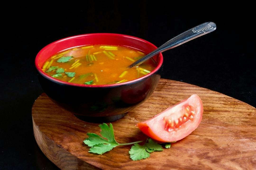 Tomato Dhaniya Shorba from Rock N Grill Indian Authentic Cuisine & Bar in Round Rock, TX