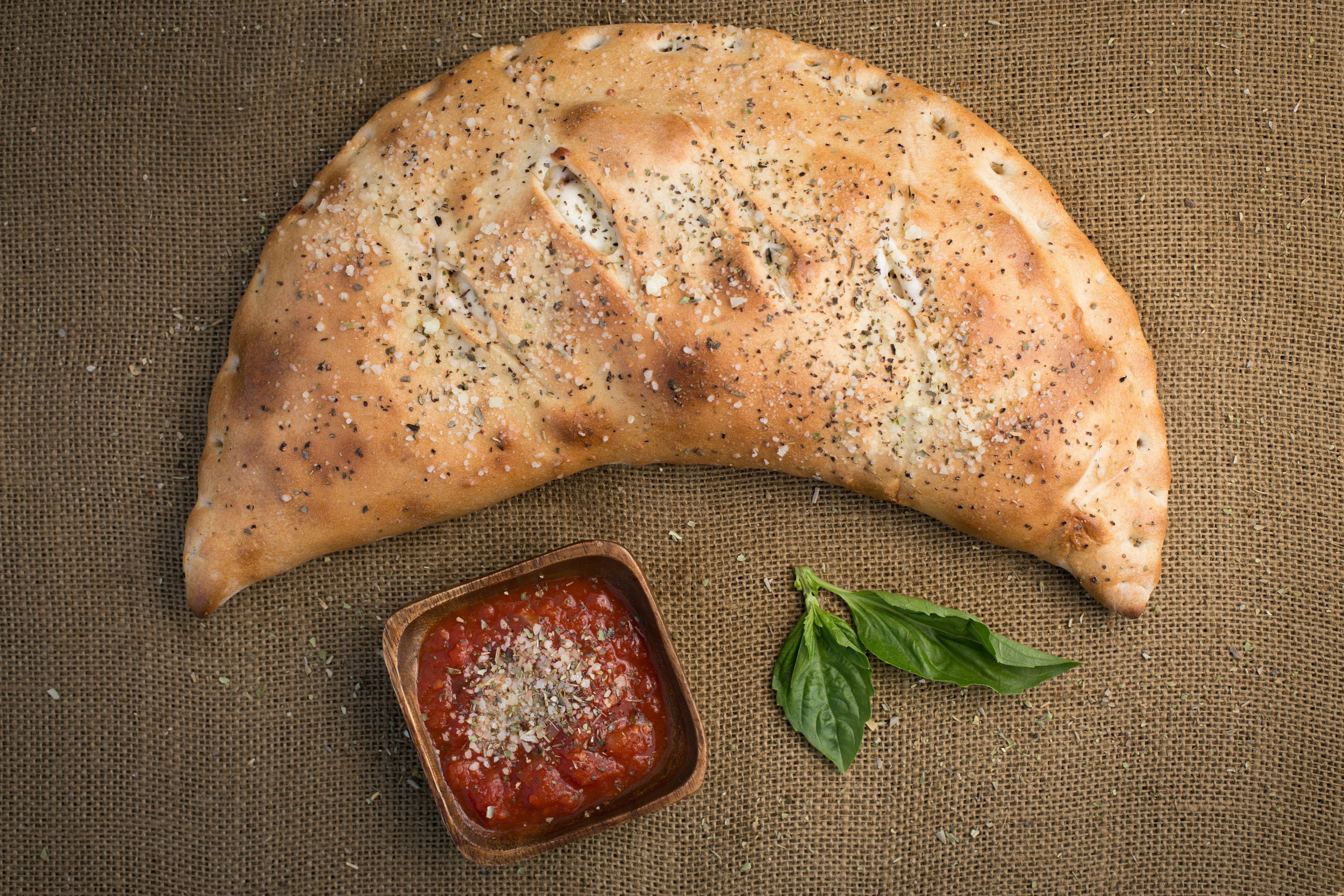 Mozzarella & Ricotta Calzone from Legends Pizza - Wolf Rd in Colonie, NY