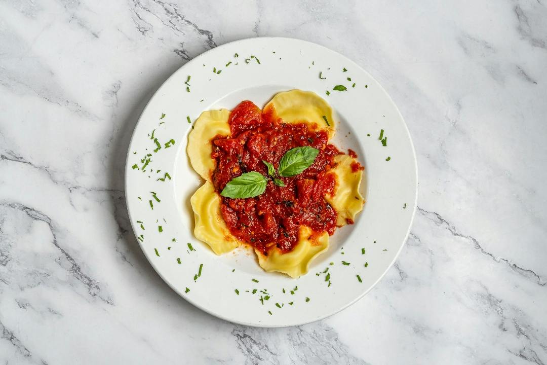 Ravioli Marinara Sauce from 4 Brothers Italian Restaurant & Pizzeria in Delray Beach, FL