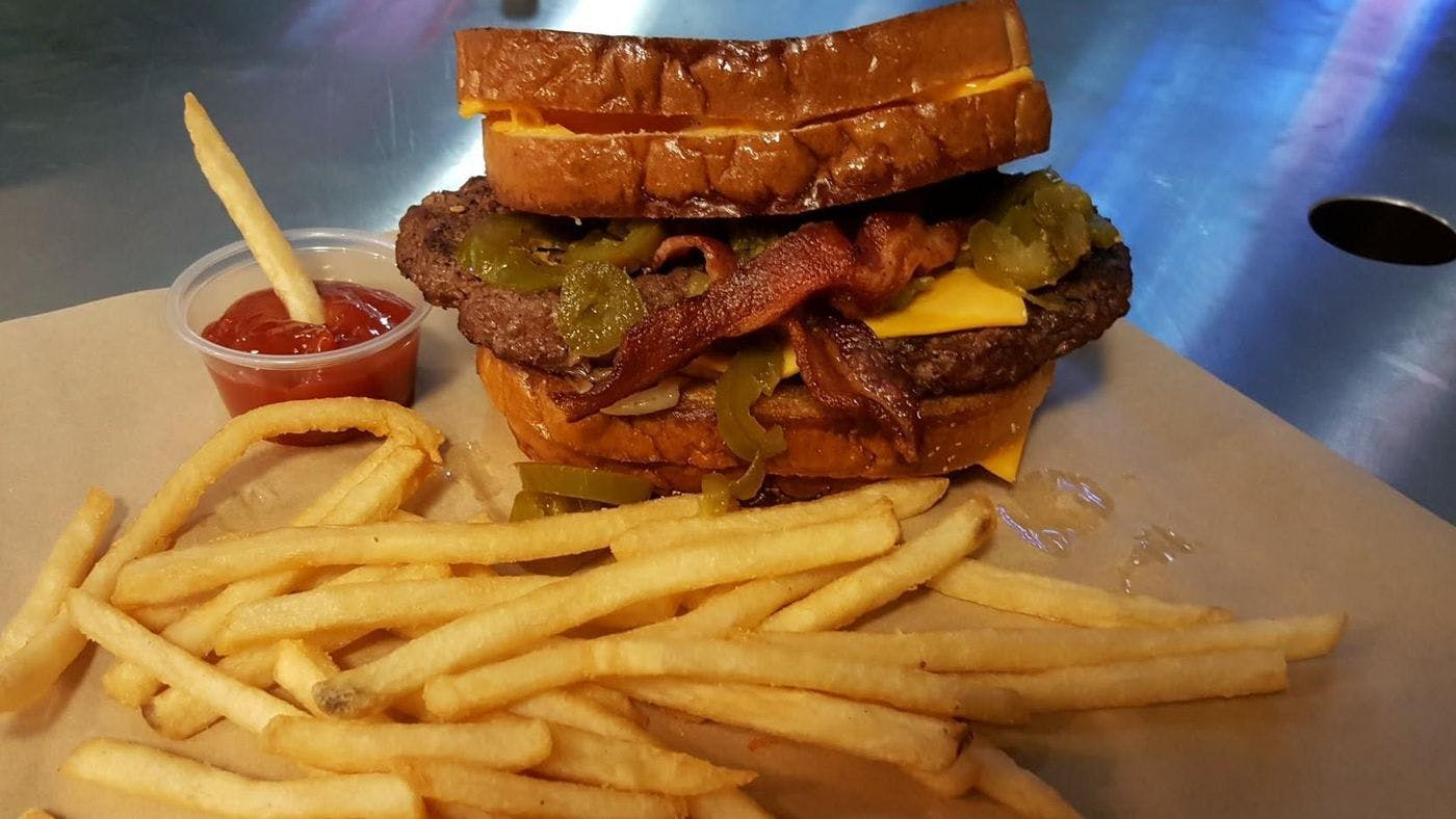 Double Patty wedged between 2 Grilled Cheese*** from All American BBQ in West Hills, CA