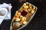 Crab Rangoon (4 pcs) from Oriental Bistro & Grill in Lawrence, KS