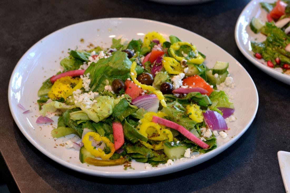 Greek Salad from Flames Mediterranean Bar & Grill - Vero Beach in Vero Beach, FL