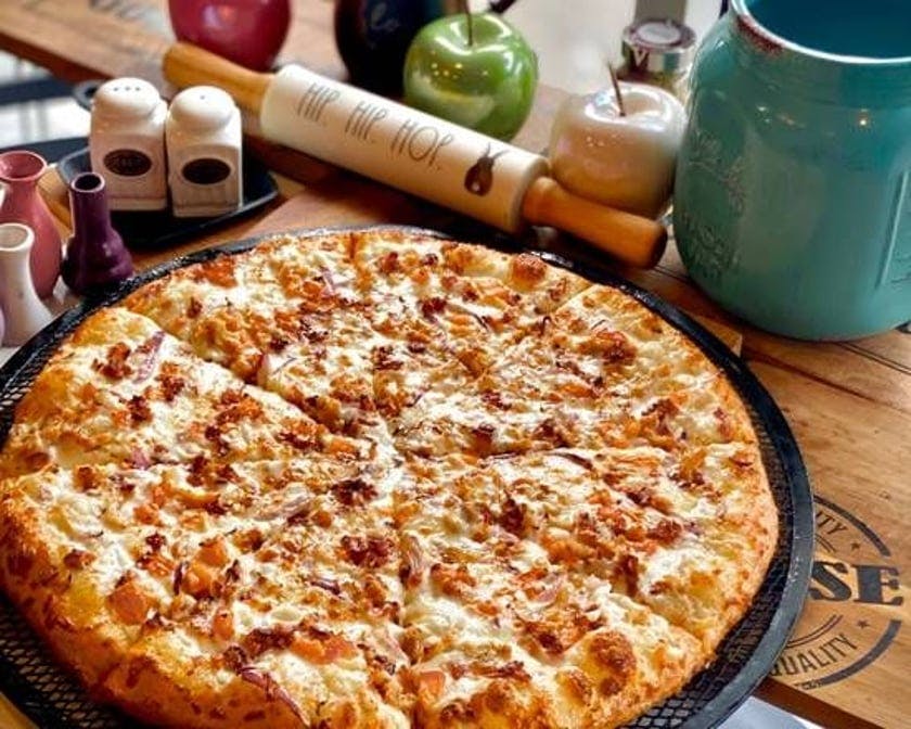 Original Butter Chicken Pizza from Slice of Italy - Kent in Renton, WA