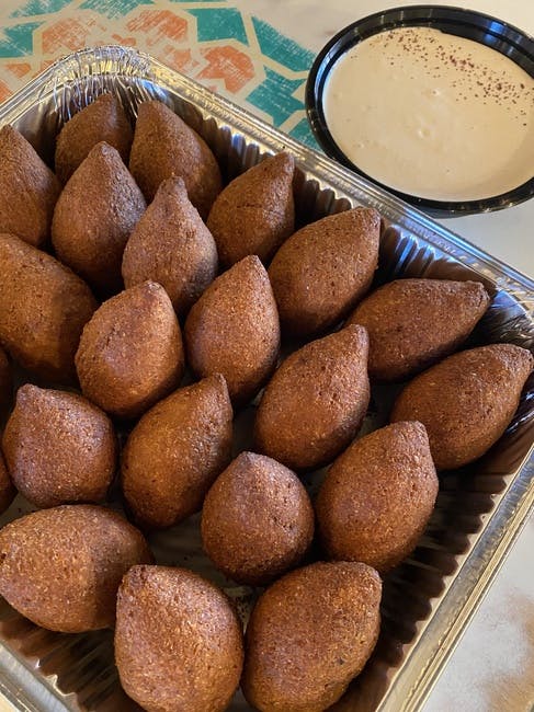 Kibbe with meat (12pcs) from Mezze #1 in Conroe, TX