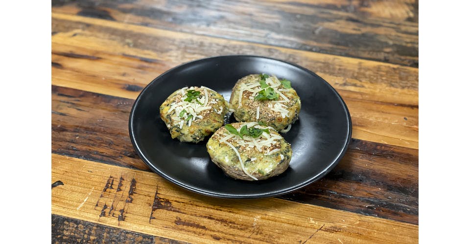 Spinach Stuffed Mushrooms Caps from Sip Wine Bar & Restaurant in Tinley Park, IL