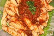 side of pasta with bolognese from Nino's Italian Restaurant in Atlanta, GA
