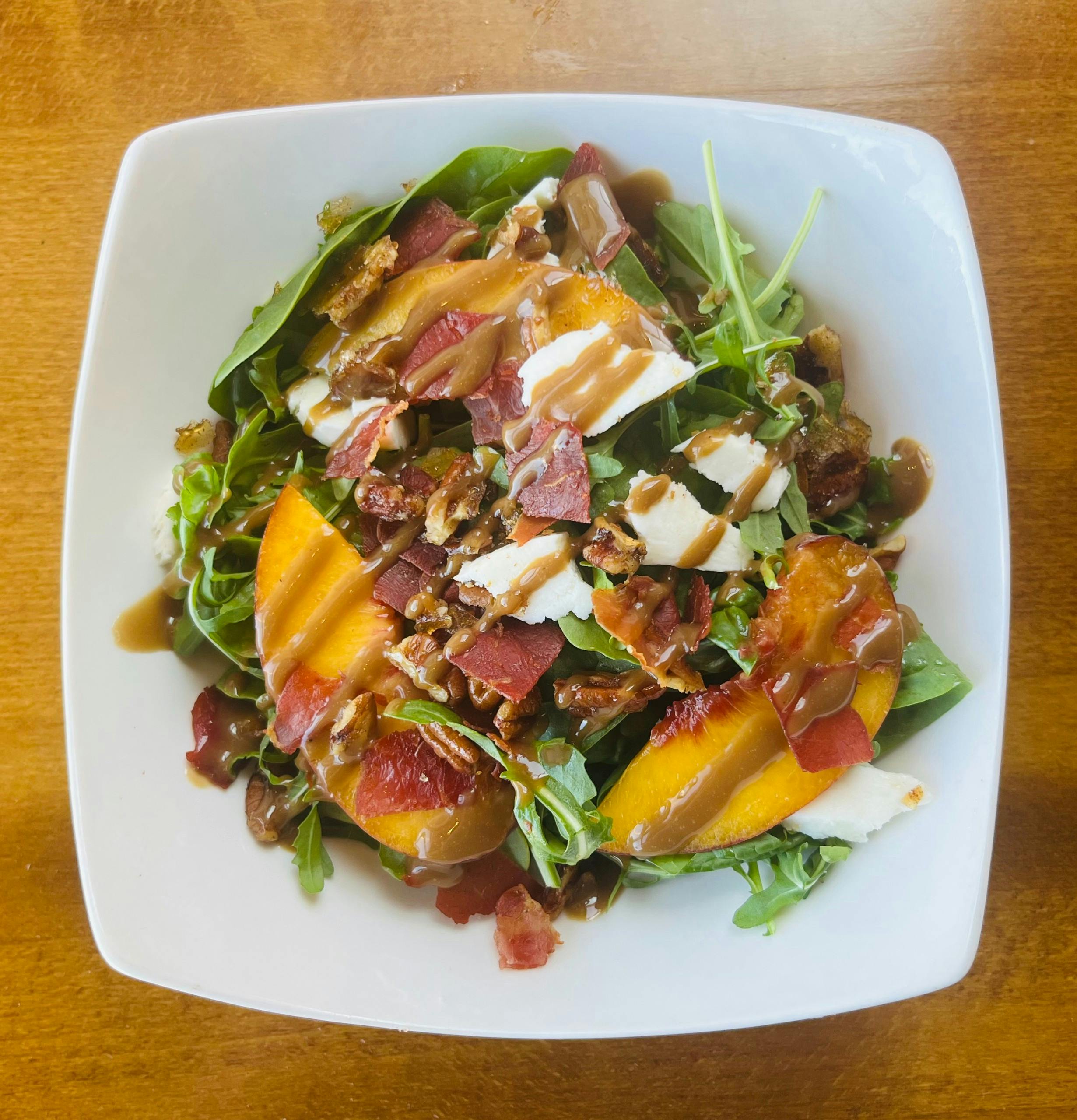 Peach & Prosciutto Salad from Arrosto Delicatessen in Sheboygan, WI