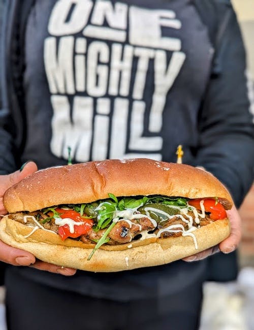 Rosemary Chicken Sub with Parm & Vinegar Peppers (Mon & Tues only) from One Mighty Mill Cafe - Exchange St in Lynn, MA