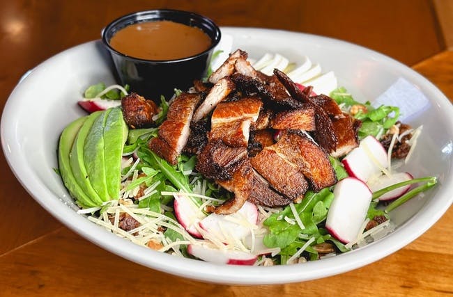 Crispy Pork Belly Pecan, Arugula, and Parmesan Salad from Monk's Bar & Grill - Sun Prairie in Sun Prairie, WI