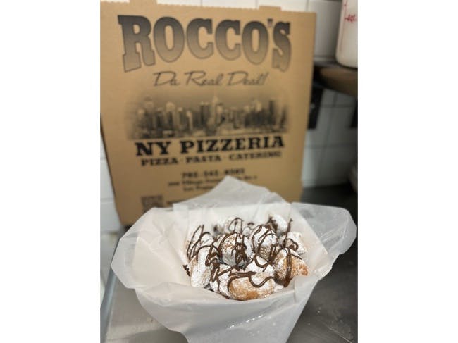 Zeppoles with Nutella Drizzle from Rocco's NY Pizza and Pasta - Village Center Cir in Las Vegas, NV