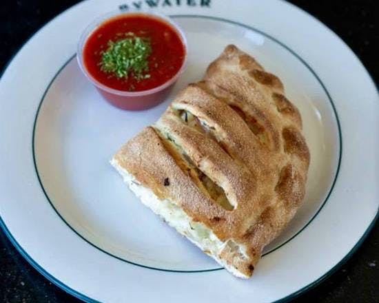 Hawaiian Calzone from Ameci Pizza & Pasta - Lake Forest in Lake Forest, CA