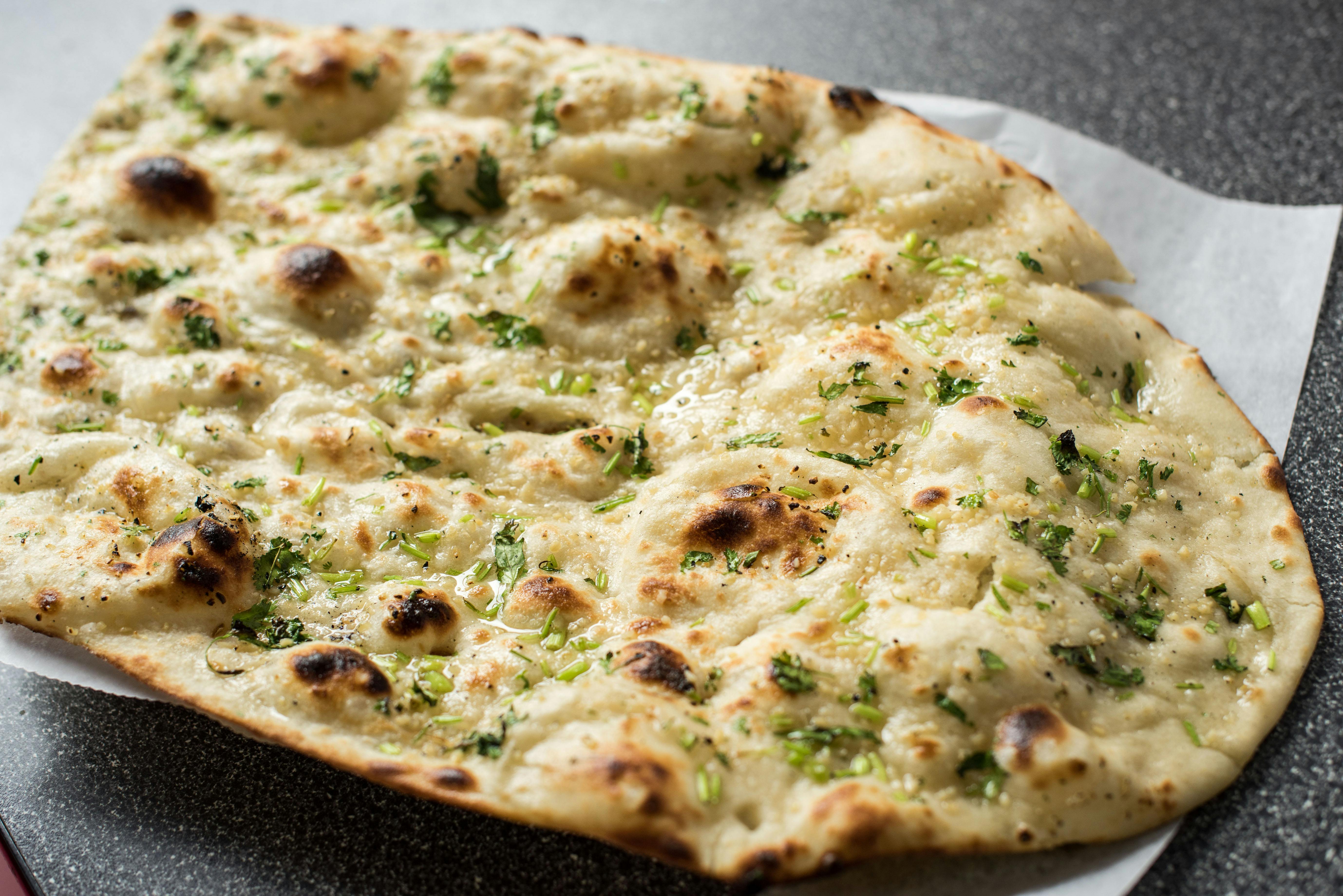 Garlic Naan from Cafe India Bar & Grill in Milwaukee, WI