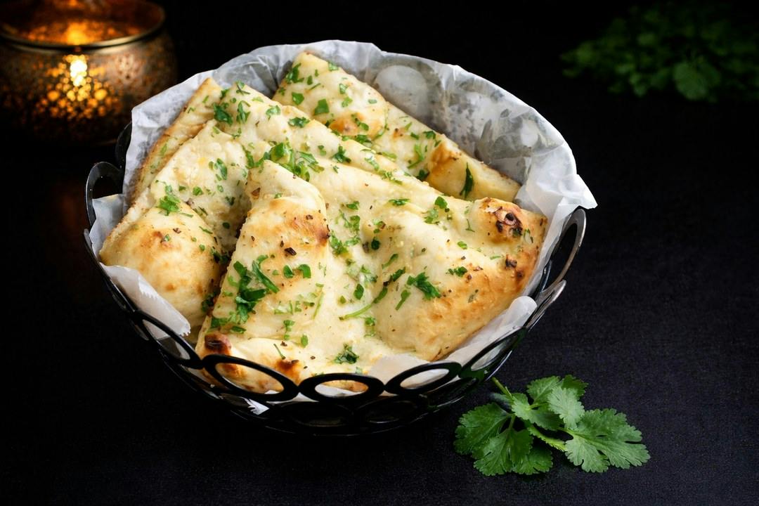 Garlic Cilantro Naan from Rock N Grill Indian Authentic Cuisine & Bar in Round Rock, TX