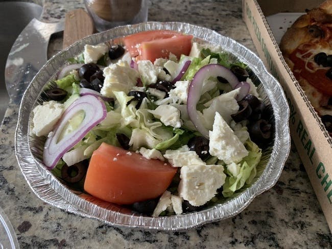 Greek Salad from Caprissi Pizza & Pasta in Garland, TX
