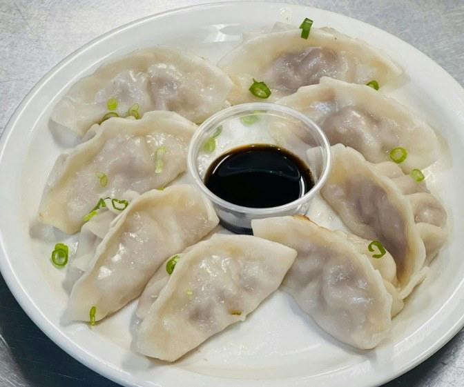 Steamed Dumplings (8) from Happy Wok - Elmwood Ave in Middleton, WI