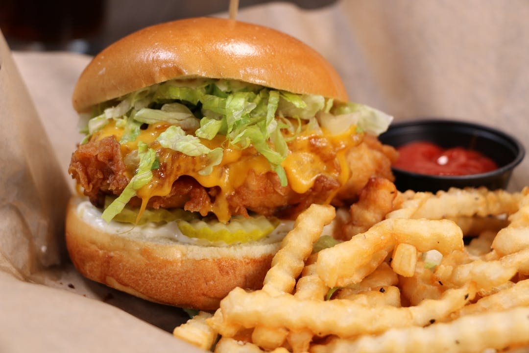 Crispy Chicken Sandwich - French Fries from The Brass Tap - Main Street in Cedar Falls, IA